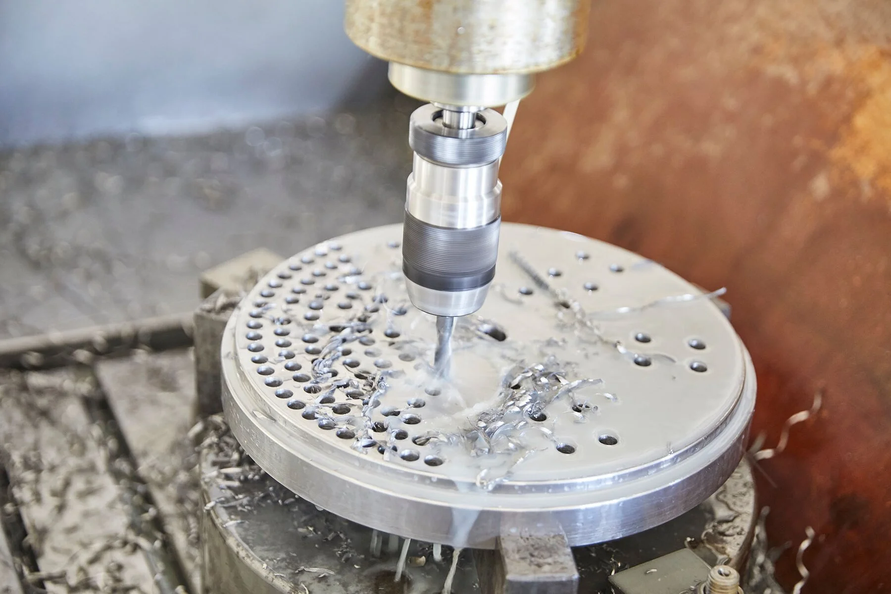 Drilling holes in compressor valve