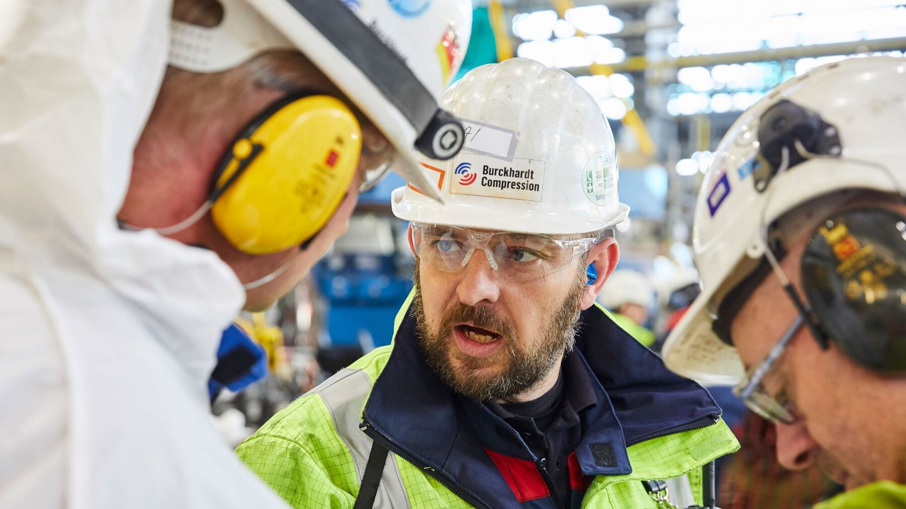 Technicians on customer site in discussion