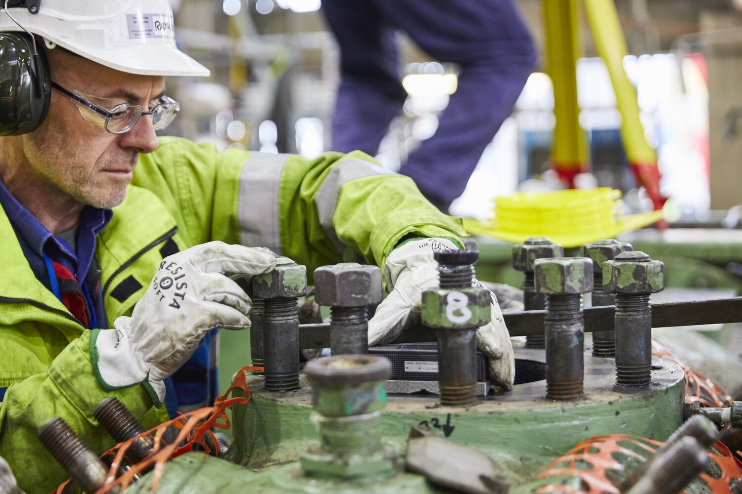Technician repairing compressor