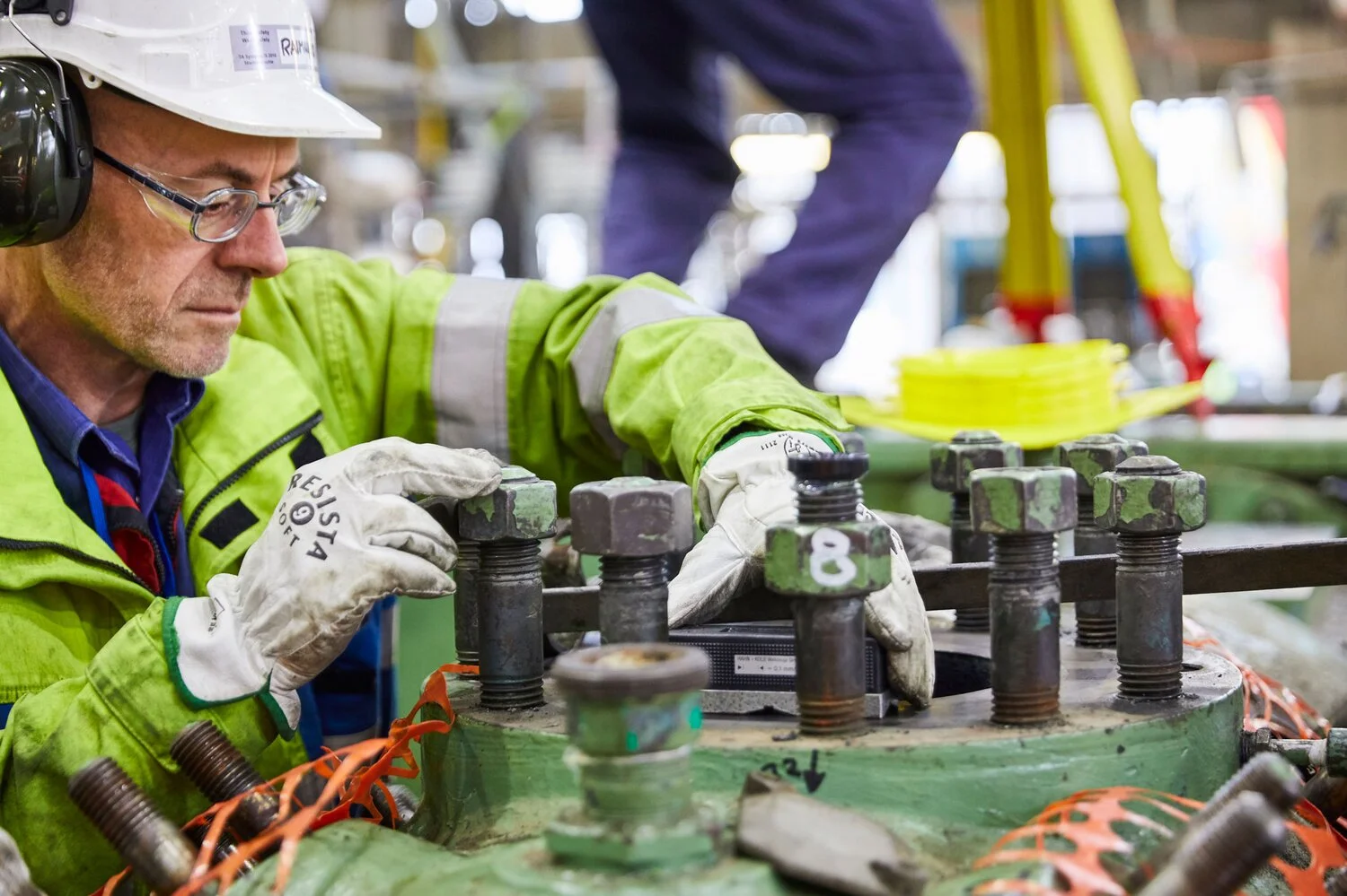 Technician repairing compressor